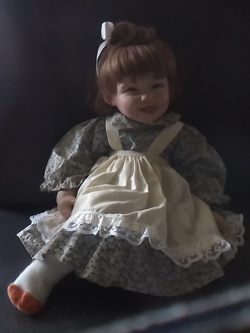 Classic Porcelain Doll in Cream Dress and Floral Print